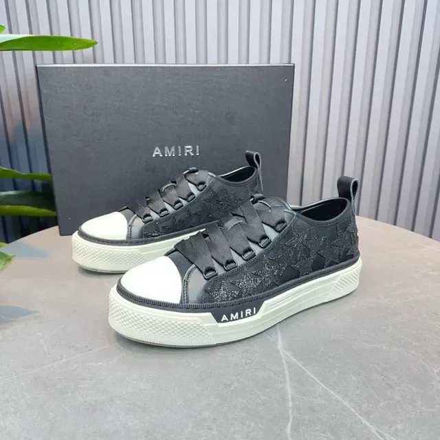 Amiri Skel Top Low তারা-এমব্রয়ডারি কালো এবং সাদা লাইফস্টাইল স্নিকার 8