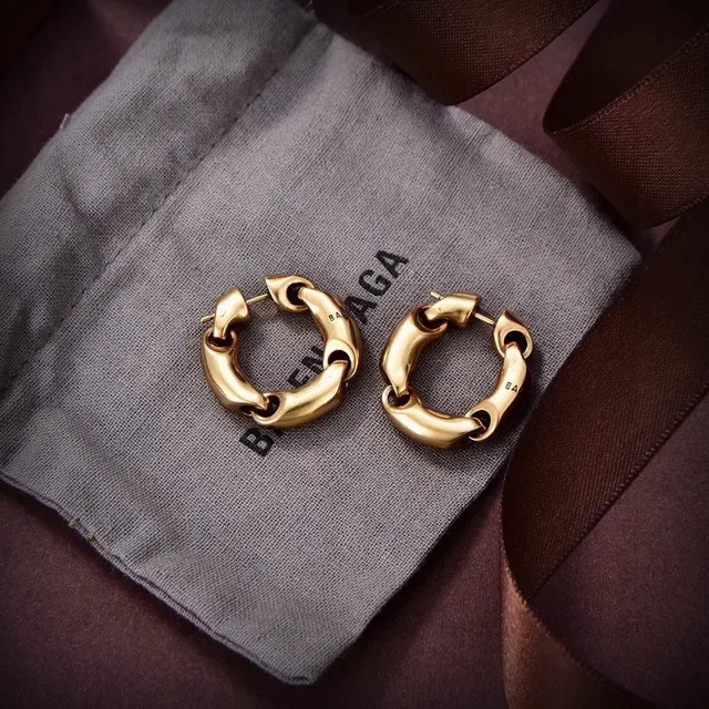 Balenciaga Le Cagole Boucles d'Oreilles à Chaîne Entrelacée Dorée 2