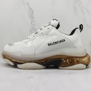 Balenciaga Triple S sneakers chunky blanches et dorées