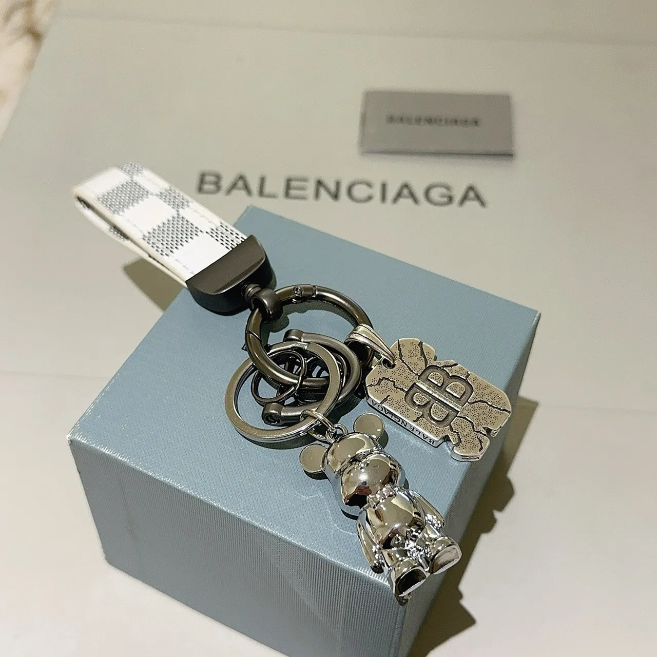 Balenciaga White Silver Checkered Leather Strap Polished Metal Phone Accessory 2