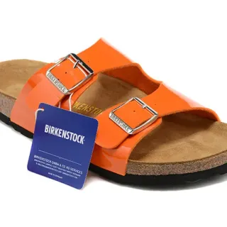 Birkenstock Arizona नारंगी पेंटेंट केजुअल सैंडल्स