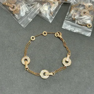Bvlgari B.zero1 ट्रिपल सर्कल पावे डायमंड गोल्ड टोन ब्रेसलेट