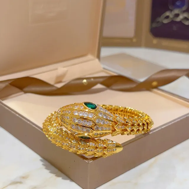 Bvlgari Serpenti Bracelete de serpente tom dourado pavé olho de esmeralda 4