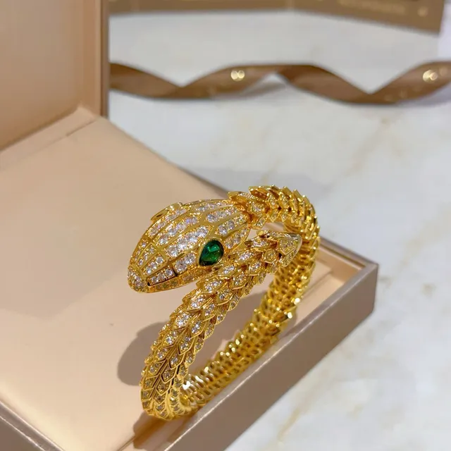 Bvlgari Serpenti Bracelete de serpente tom dourado pavé olho de esmeralda 9