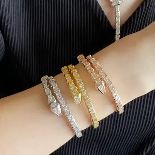 Bvlgari Serpenti चांदी-स्वर्ण आर्टिकुलेटेड ज्योमेट्रिक लिंक्स पवसेट स्टोन्स ब्रेसलेट