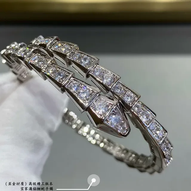 Bvlgari Serpenti রূপালী সোনার আর্চুলেটেড জ্যোমেট্রিক লিঙ্কস পাভে-সেট স্টোনস ব্রেসলেট 6
