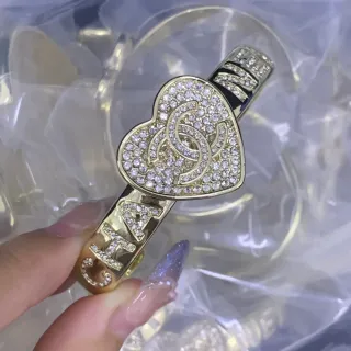 Chanel Heart Bangle Gold Black Pavé Crystal Centerpiece Interlocking CC Logo Bracelet