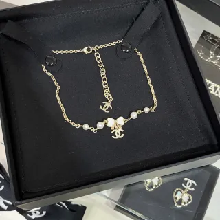 Chanel لؤلؤ وبو شارم سوار ذهبي