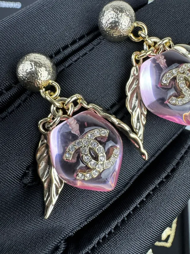 Chanel Pink Resin Winged CC Logo Earrings 7