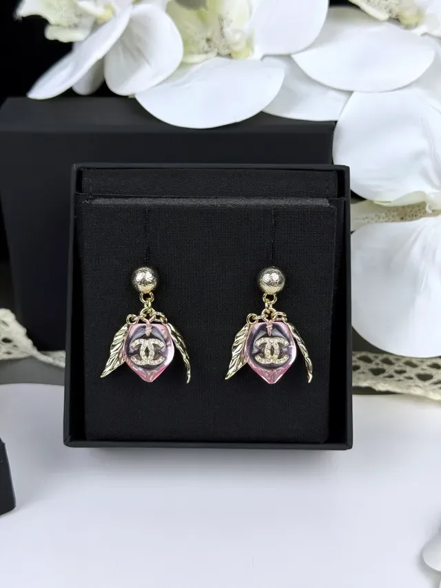 Chanel Pink Resin Winged CC Logo Earrings 9