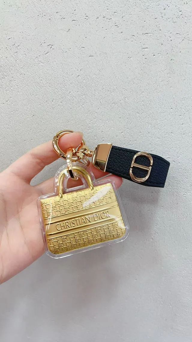 Dior Mini Bag Charm गोल्ड व्हाइट मिनिएचर ट्रांसपेरेंट एक्रिलिक केसिंग हैंडबैग 2