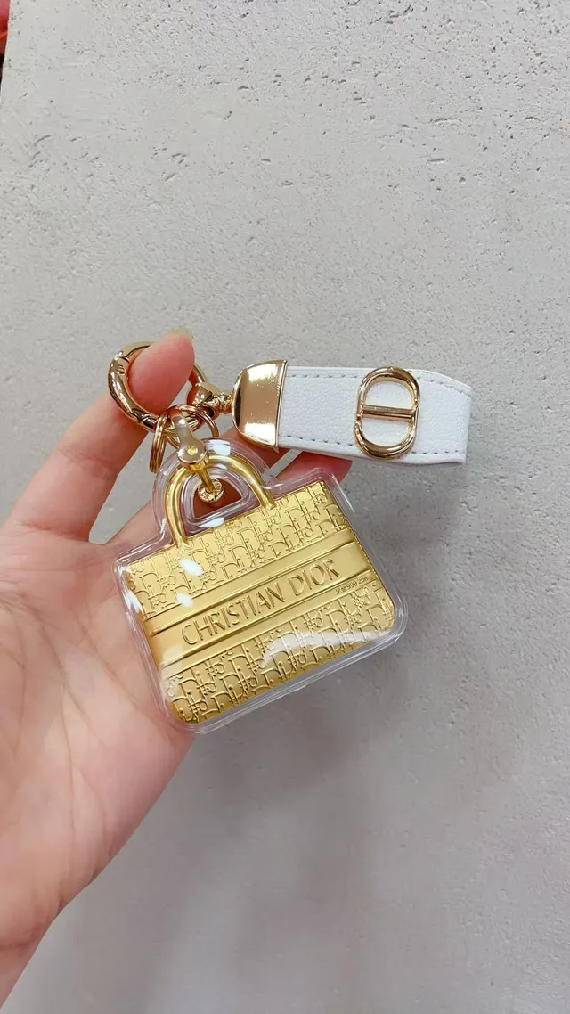 Dior Mini Bag Charm गोल्ड व्हाइट मिनिएचर ट्रांसपेरेंट एक्रिलिक केसिंग हैंडबैग 3