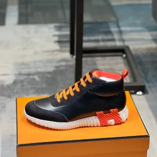 Zapatillas altas negro y naranja de material mixto con suela esculpida