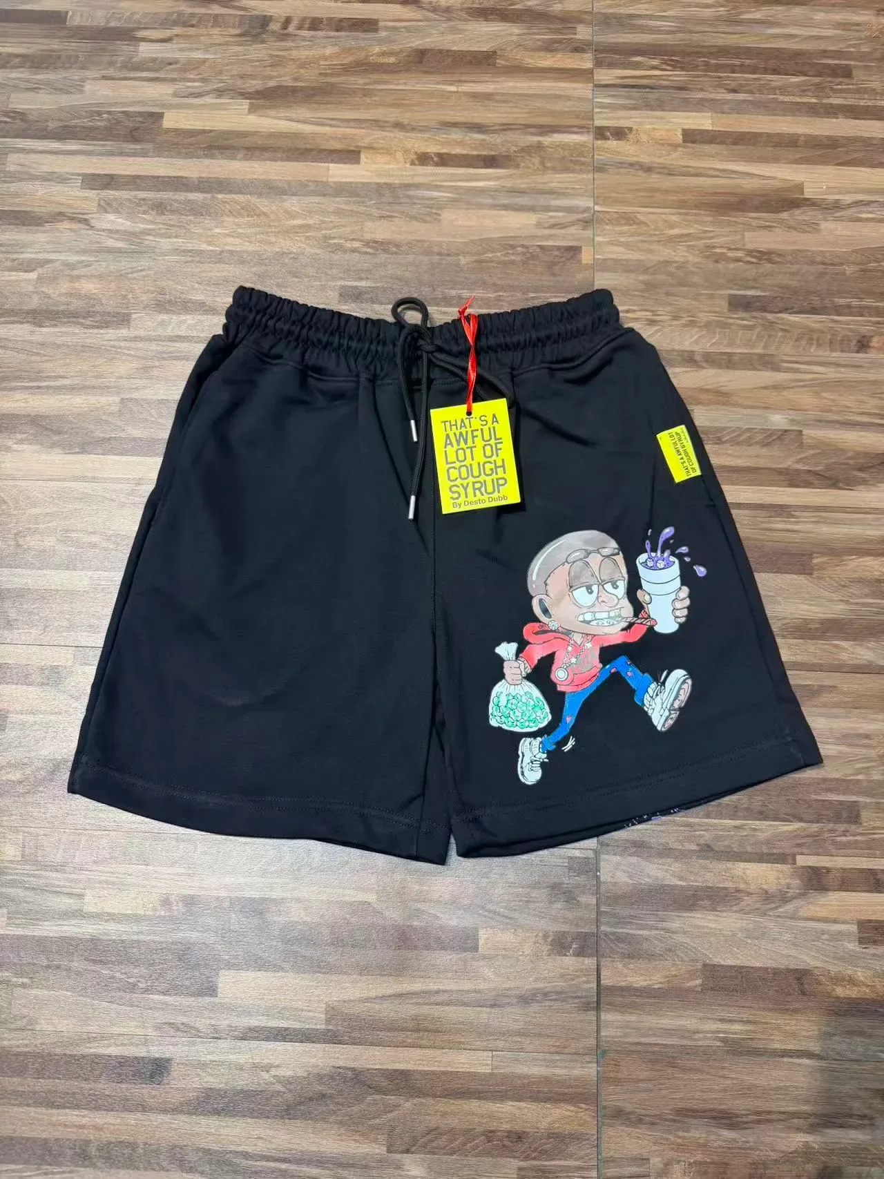 Shorts pretos com estampado gráfico e cintura elástica 3