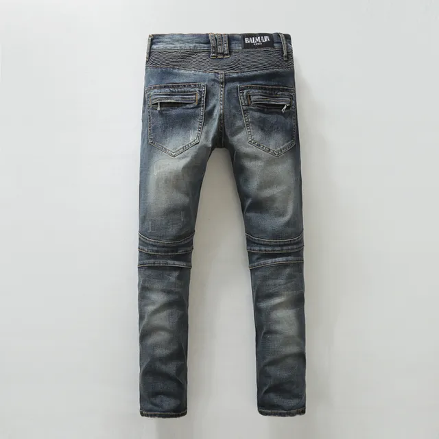 Jeans distressed moto-panelled zippé tapered 14