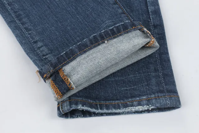 Jeans desgastados reforzados en las rodillas con bolsillo de cremallera y bajo en bruto 7