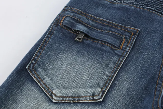 Jeans desgastados reforzados en las rodillas con bolsillo de cremallera y bajo en bruto 10