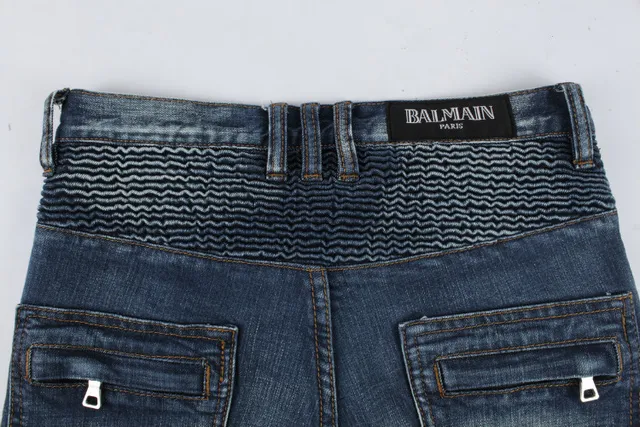 Jeans desgastados reforzados en las rodillas con bolsillo de cremallera y bajo en bruto 19