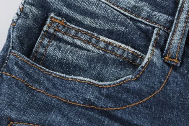 Jeans desgastados reforzados en las rodillas con bolsillo de cremallera y bajo en bruto 21