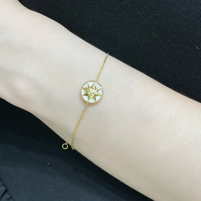 Gold and Silver Starburst Charm Bracelets 9
