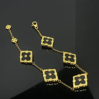 سوار سلسلة ذهبية سوداء مع مينا أربعة أوراق