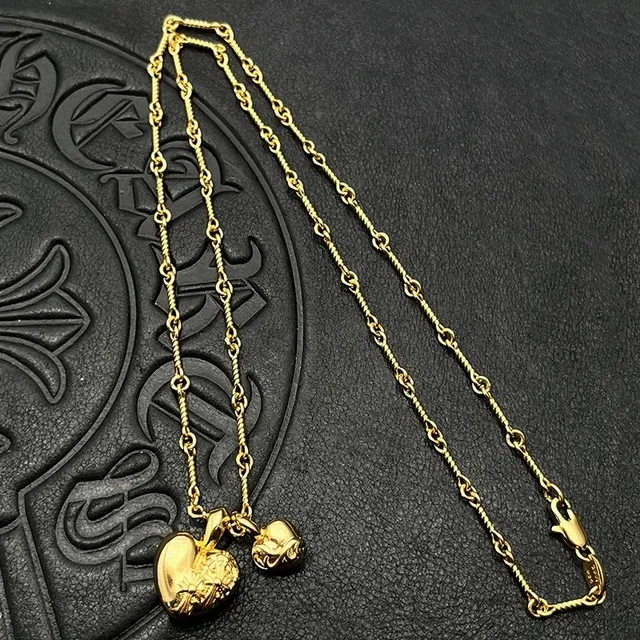 Colar com pingante de coração dourado preto 4