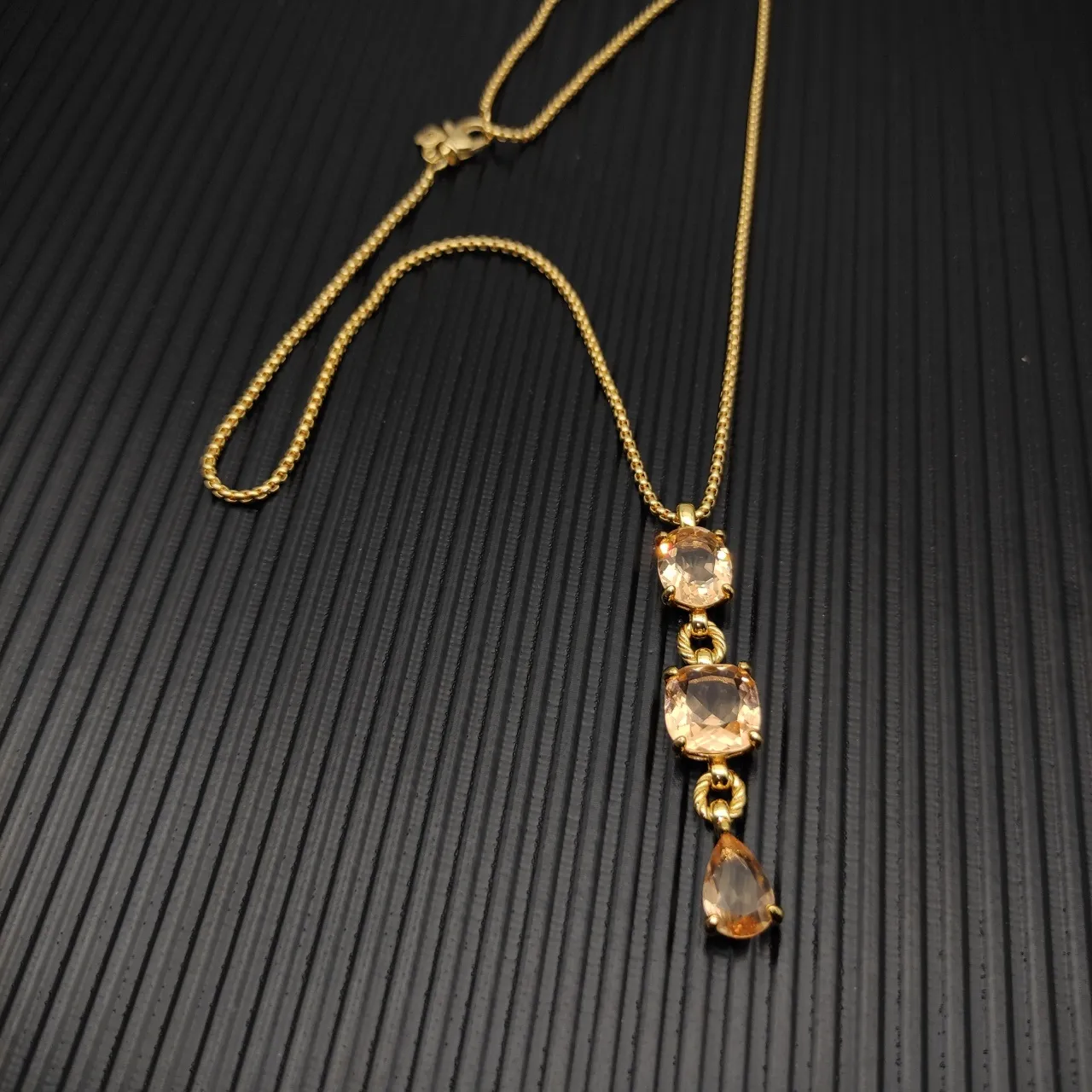 Gold Orange Three-Stone Vertical Pendant Twisted Connectors Necklace 3