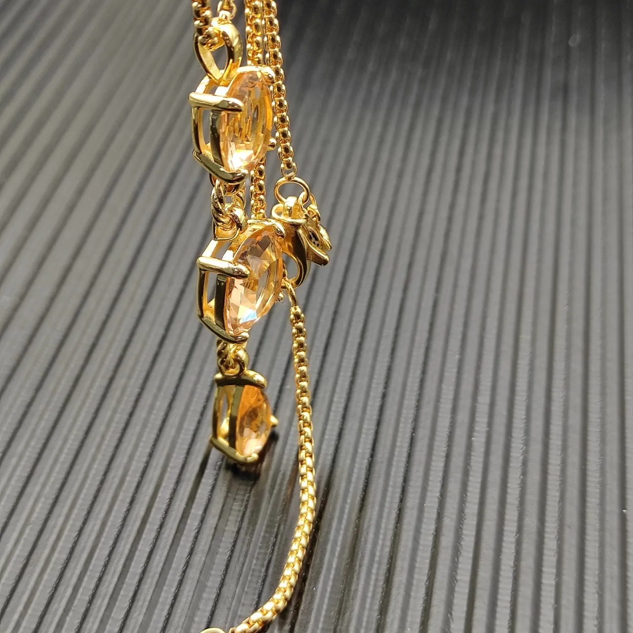 Gold Orange Three-Stone Vertical Pendant Twisted Connectors Necklace 5