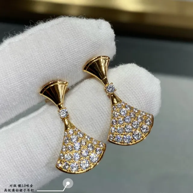 Aretes de oro y plata en forma de abanico con pavé 6