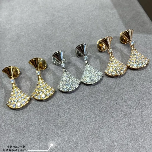 Aretes de oro y plata en forma de abanico con pavé 8