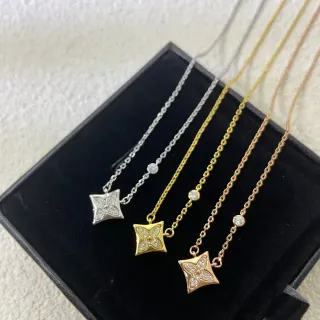Collier pendentif fleur à quatre pétales doré et argenté avec cristaux pavé-set