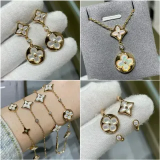 الأقراط المعلقة الذهبية البيضاء الزهرية الرباعية الأوراق