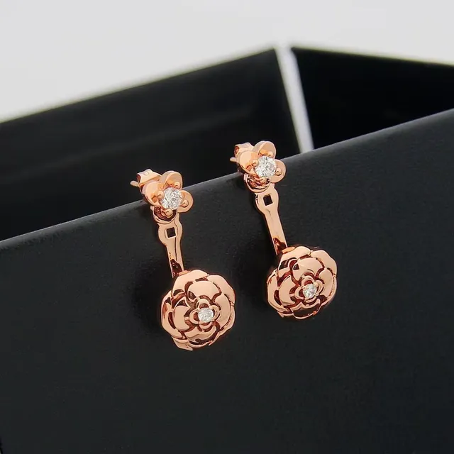 Boucles d'oreilles dorées transparentes motif floral à double niveau 2