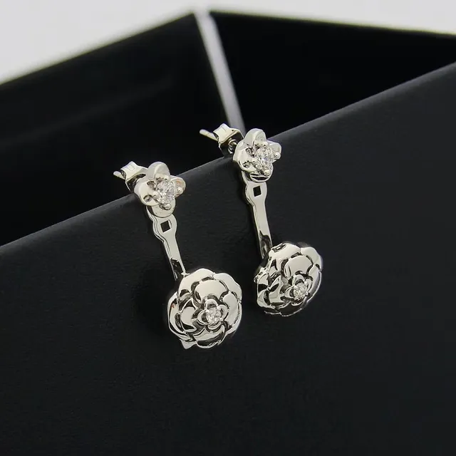 Boucles d'oreilles dorées transparentes motif floral à double niveau 4
