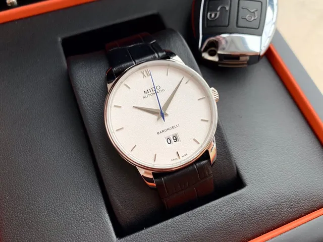 Mido Baroncelli गुलाबी सोने का टोन सफेद डायल यांत्रिक घड़ी 4