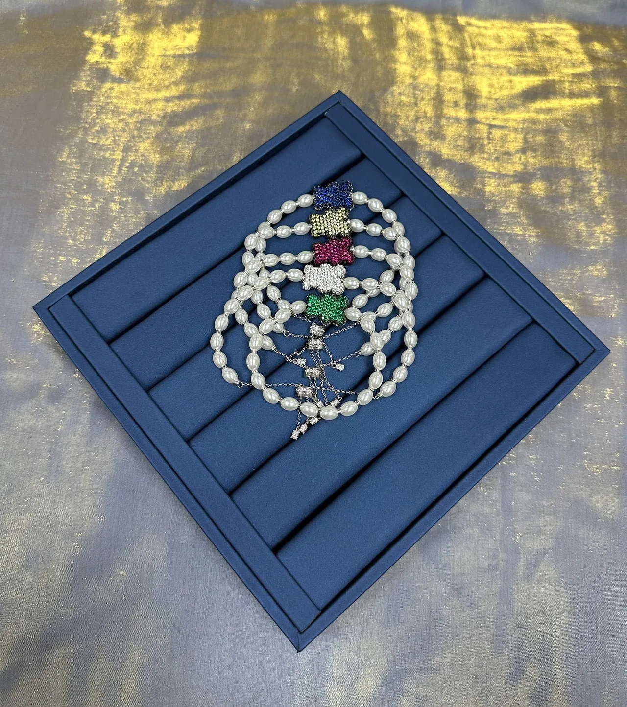 Pulseira com pérolas e cristais no centro, cor verde marinho 7