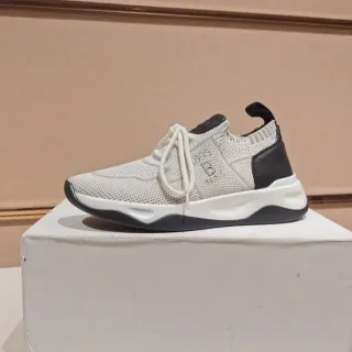 Off-White حذاء رياضي أسلوب حياة بطبقة علوية من التريكو وكعب سميك