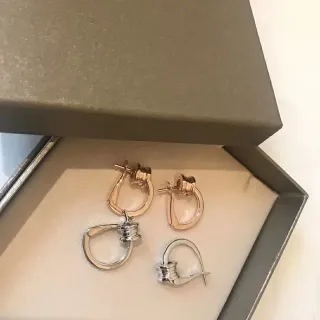 خاتم أذن ذهبي وردي وفضي ملتف