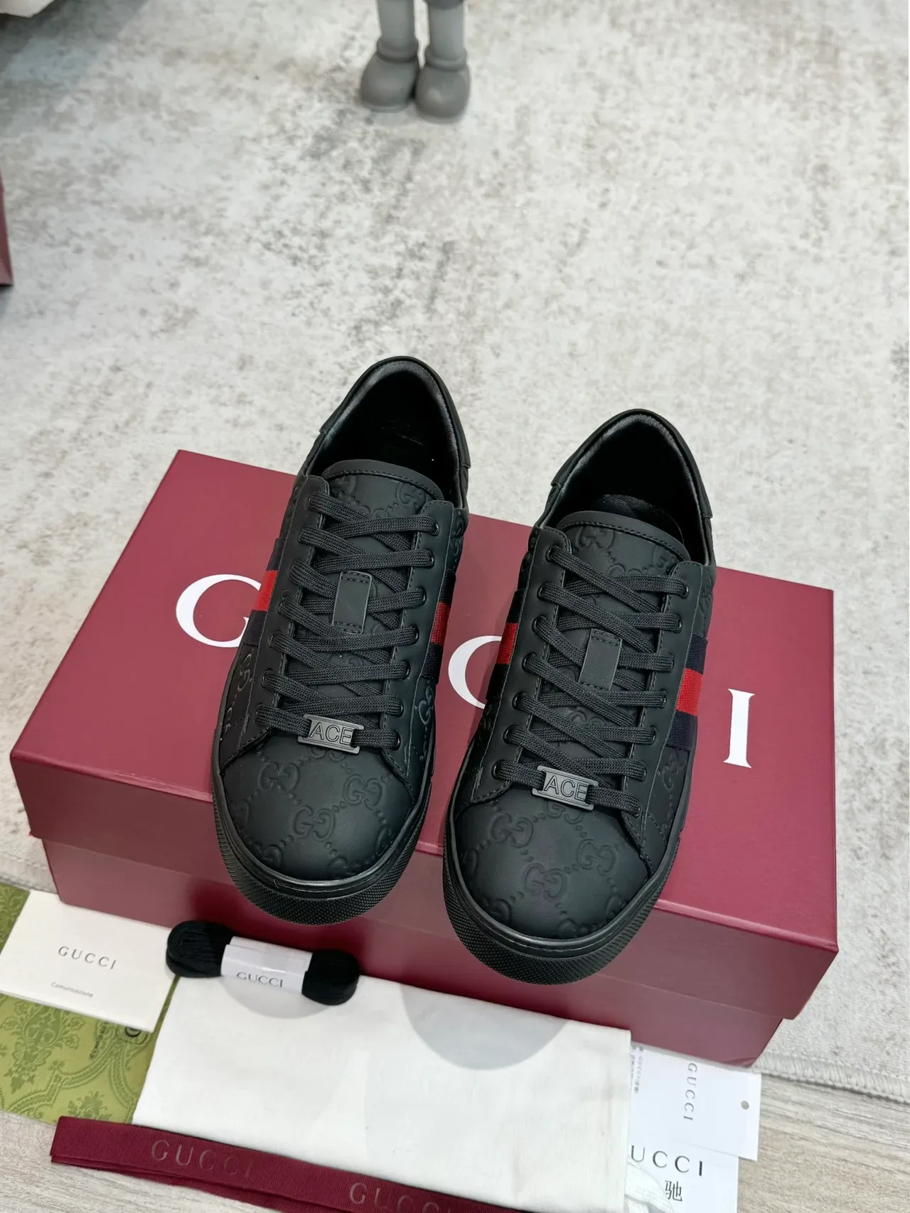 Gucci Ace Noir GG Embossed Web Stripe Sneakers Lifestyle 5