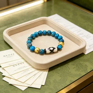 Gucci سوار أزرق ذهبي مصنوع من خرز مع حجر فيروزي الستايل