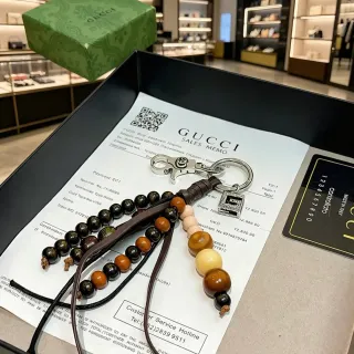 Gucci Brown Black Beaded Leather-Strapped Jewelry