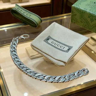 Gucci سلسلة فضية بيج كثيفة قوس منحوتة علامة تجارية سوار