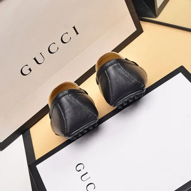 Gucci Horsebit 1955 GG Monogram 帆布和黑色皮革乐福鞋 2