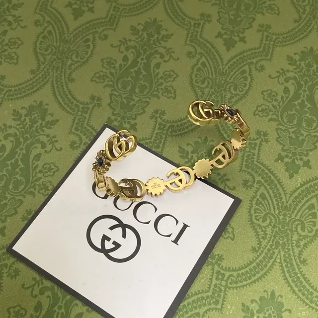 Bracelet Gucci Interlocking G et Motif Floral en ton doré 3