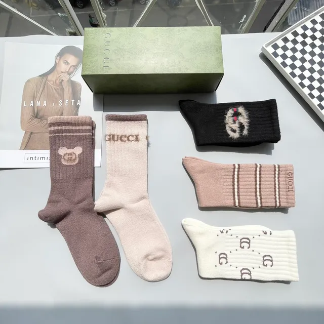 Calcetines de punto con logo y motivo Gucci 7