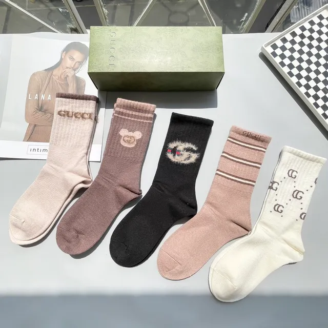Calcetines de punto con logo y motivo Gucci 8