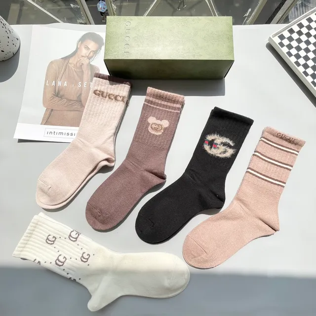 Calcetines de punto con logo y motivo Gucci 9