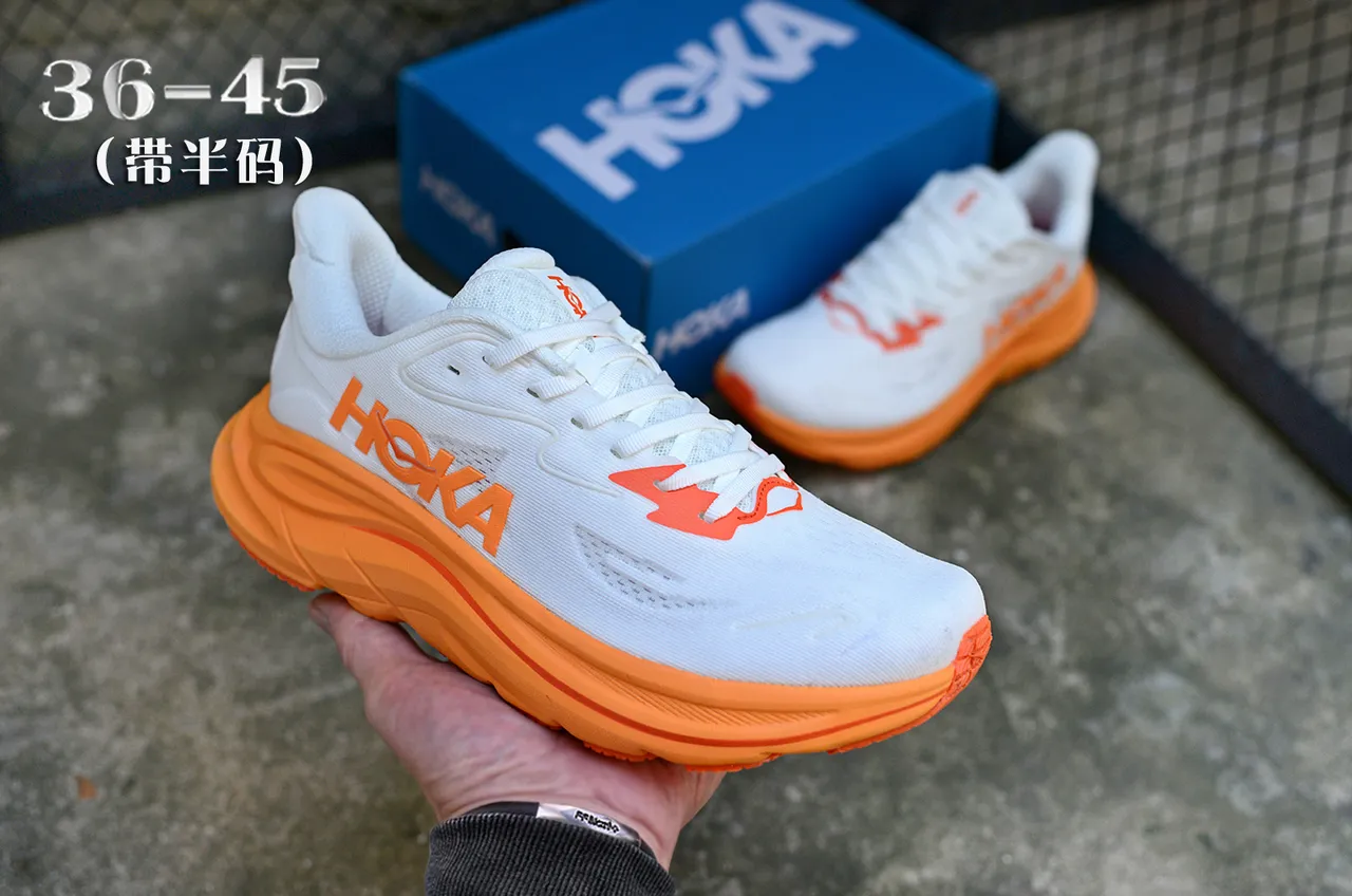 Hoka White Orange Maximalist Cushioned Sole Engineered Knit Upper Running Shoes 3
