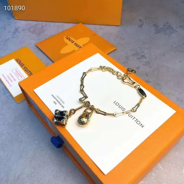 Bracelet Louis Vuitton Lockme Chaîne à maillons Or Noir LV Monogram Cadenas Charme 6