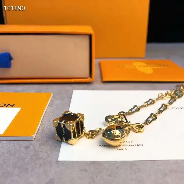 Bracelet Louis Vuitton Lockme Chaîne à maillons Or Noir LV Monogram Cadenas Charme 9